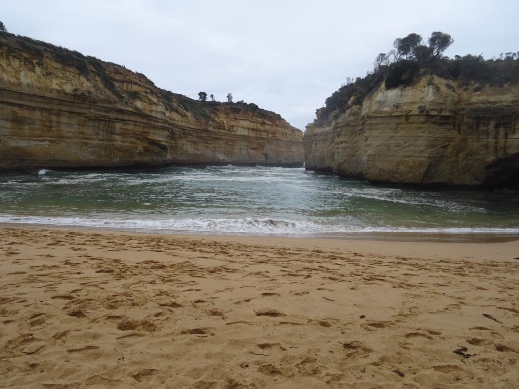 The sandy beach at the bottom of Loch Ard Gorge