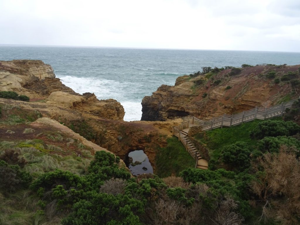 The view of the Grotto from the carpark, showing the stairs that lead down the cliff to the grotto itself