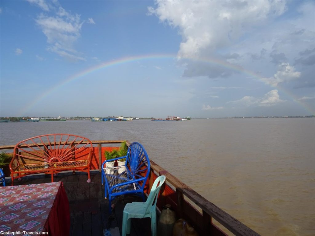 Admiring the double rainbow from the back of the boat