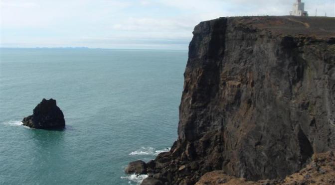 Looking over the cliffs towards Dyrhólaey lighthouse