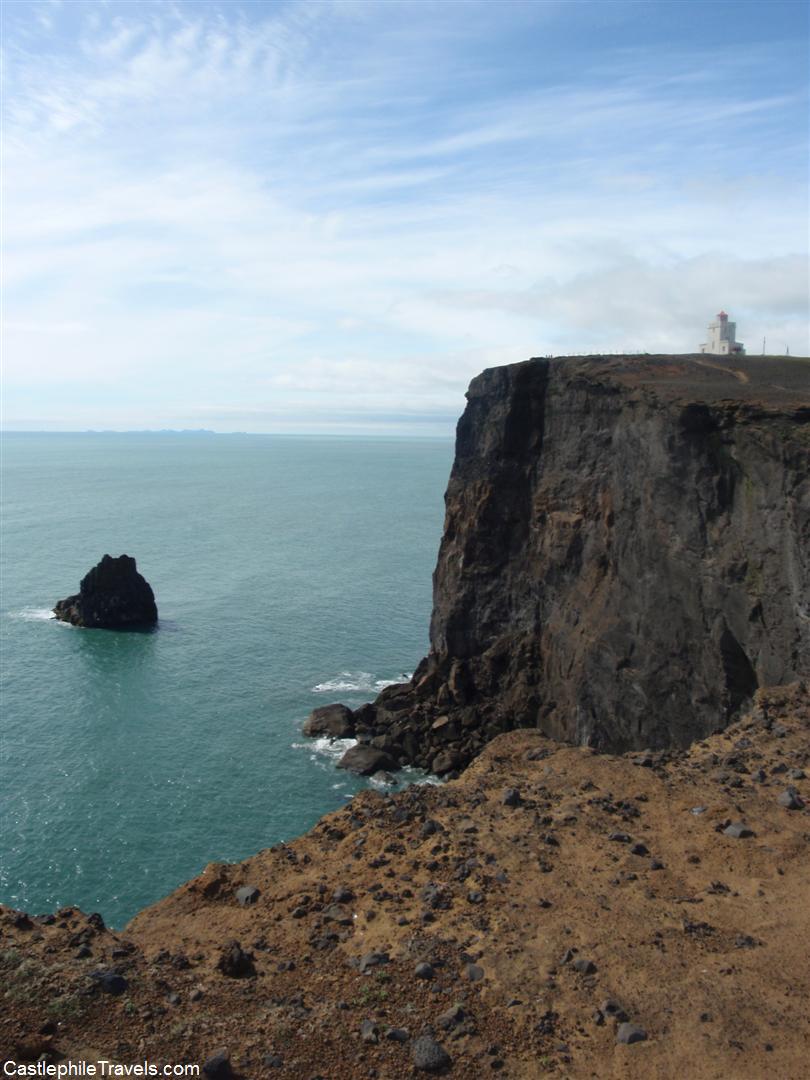 Looking over the cliffs towards Dyrhólaey lighthouse 